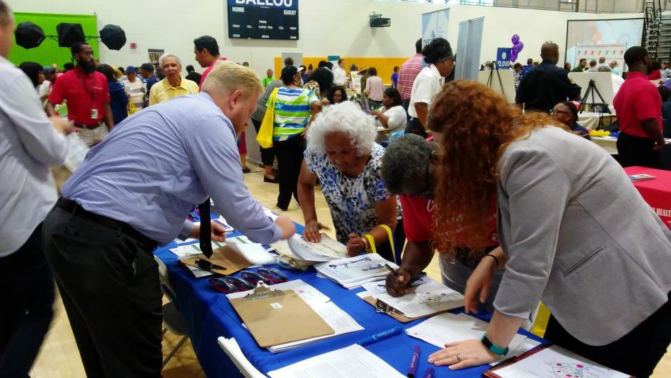 Community members taking the survey on the current distribution of affordable housing