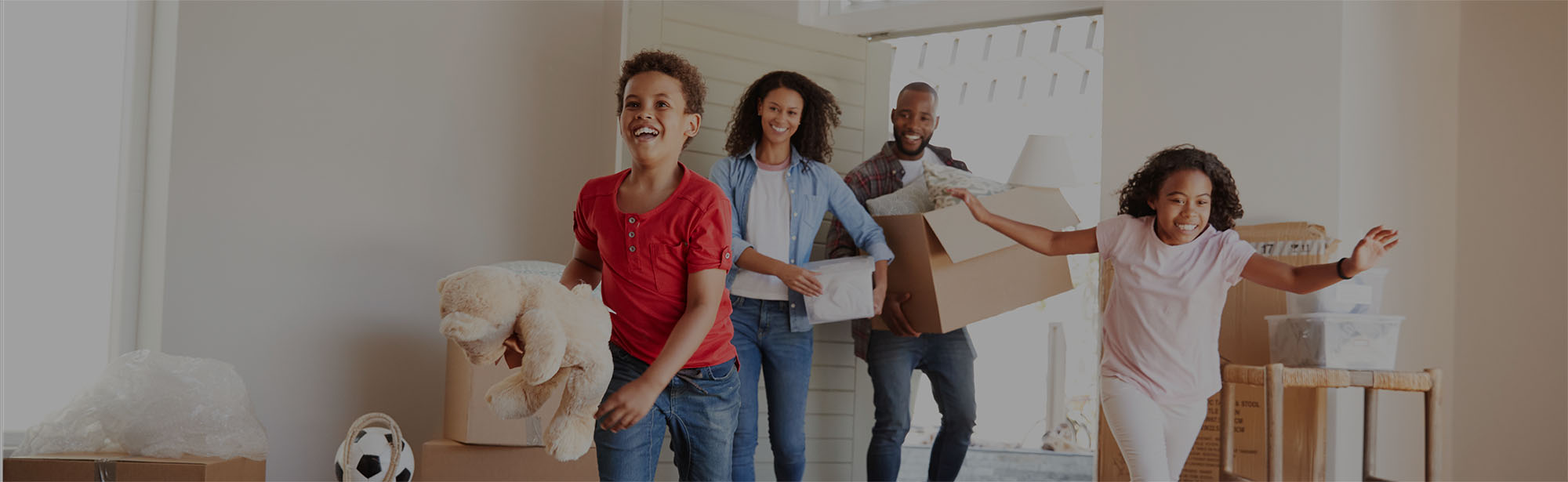 Family entering a home